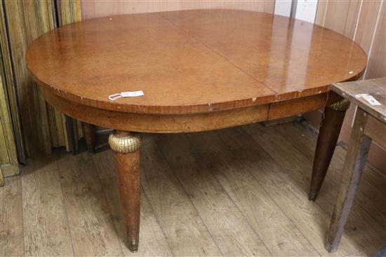 A French birds eye maple extending dining table W.150cm